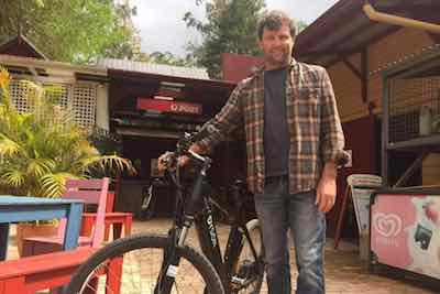 A Tyalgum resident poses with his electric bike